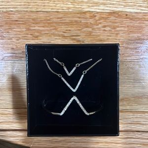 Victoria’s Secret. 2 necklaces and 1 bracelet with V on it. Gold with diamonds.